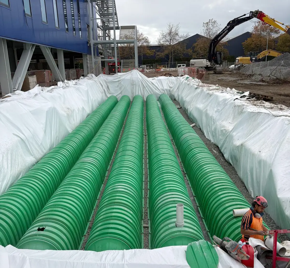 Five rows of pipes being laid at the Ikea store in Auckland